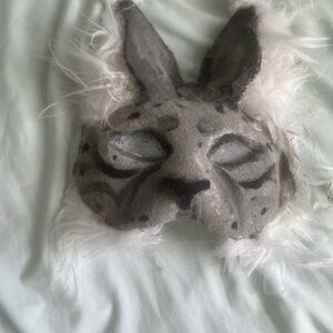Gray and black therian mask
